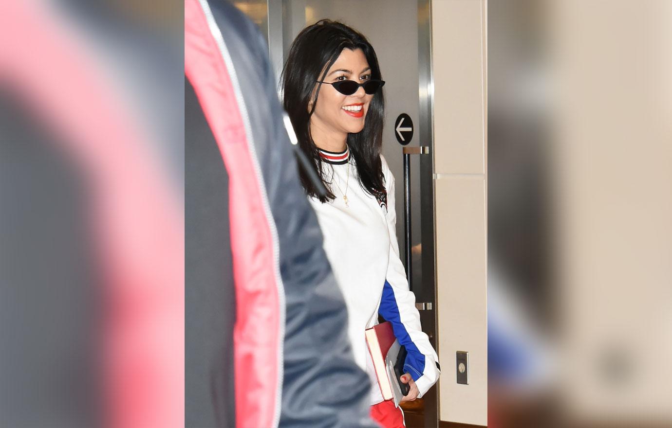 kim khloe kourtney kardashian touch down tokyo