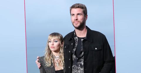 Miley Cyrus and Liam Hemsworth in the front row Saint Laurent Show