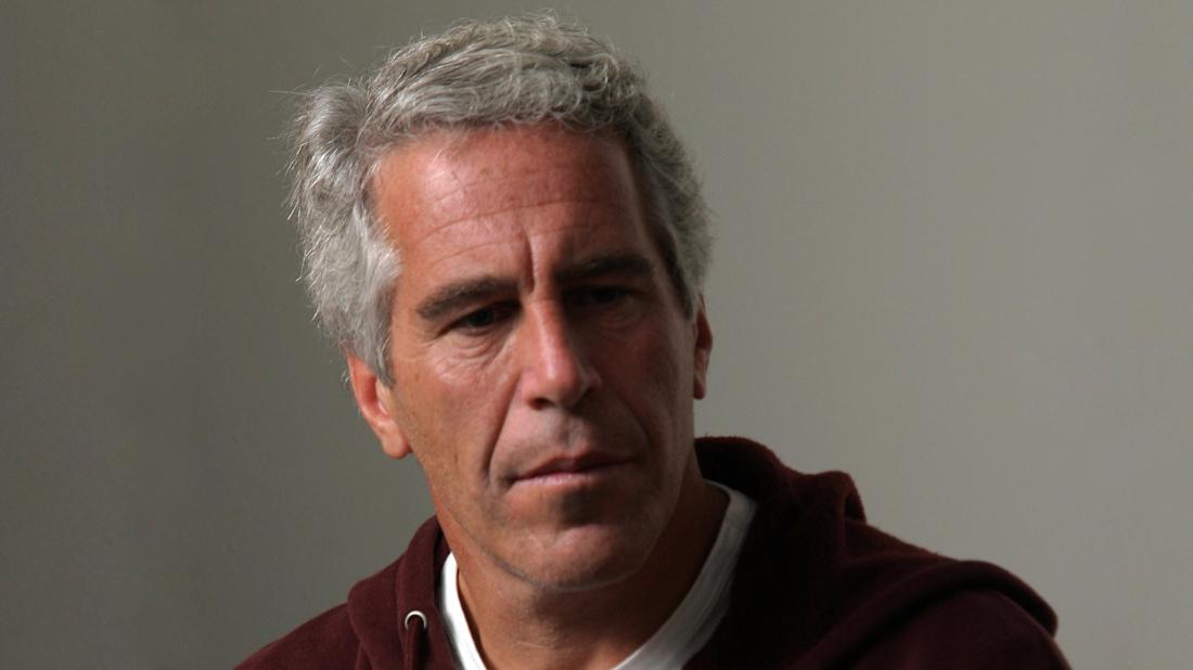 Jeffrey Epstein Closeup Looking Serious in Burgundy Hoodie