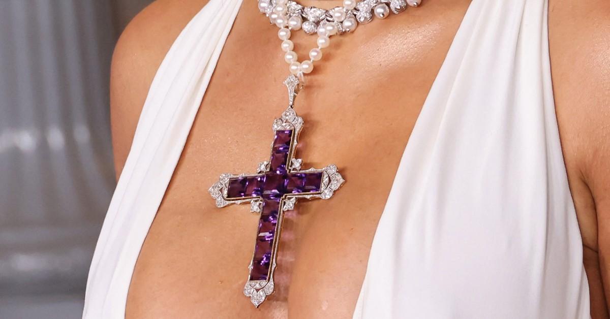 vulgar kim kardashian sickens royal fans with busty sexed up display of princess dianas iconic cross after buying tragic royals beloved necklace for