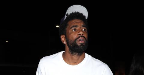 kyrie irving protestors sit courtside nets game fight antisemitism pp