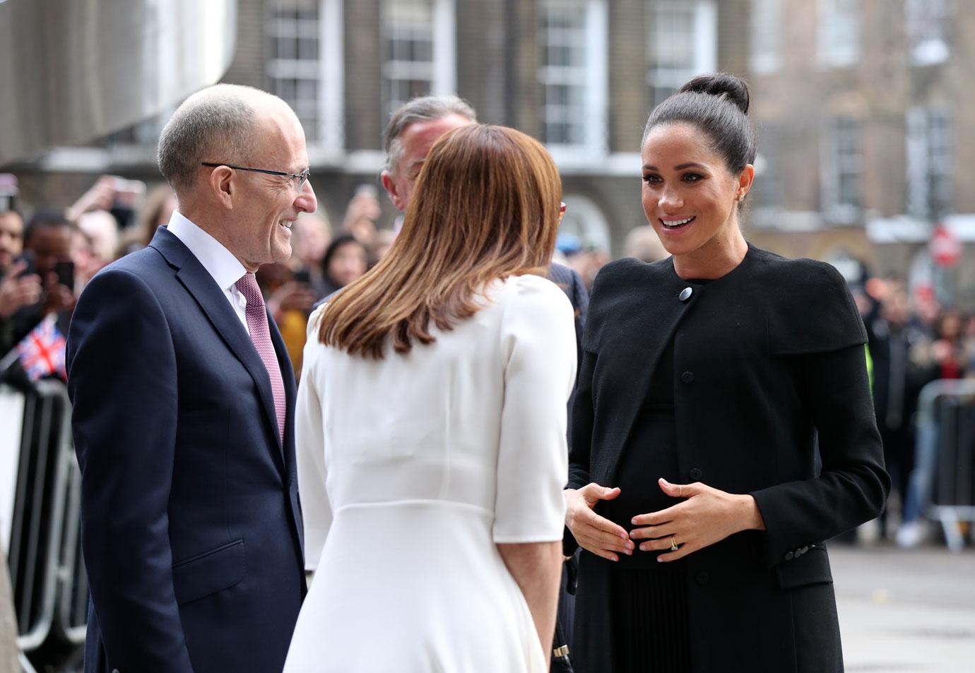 Meghan Markle Black Dress Coat Prince Harry Pub