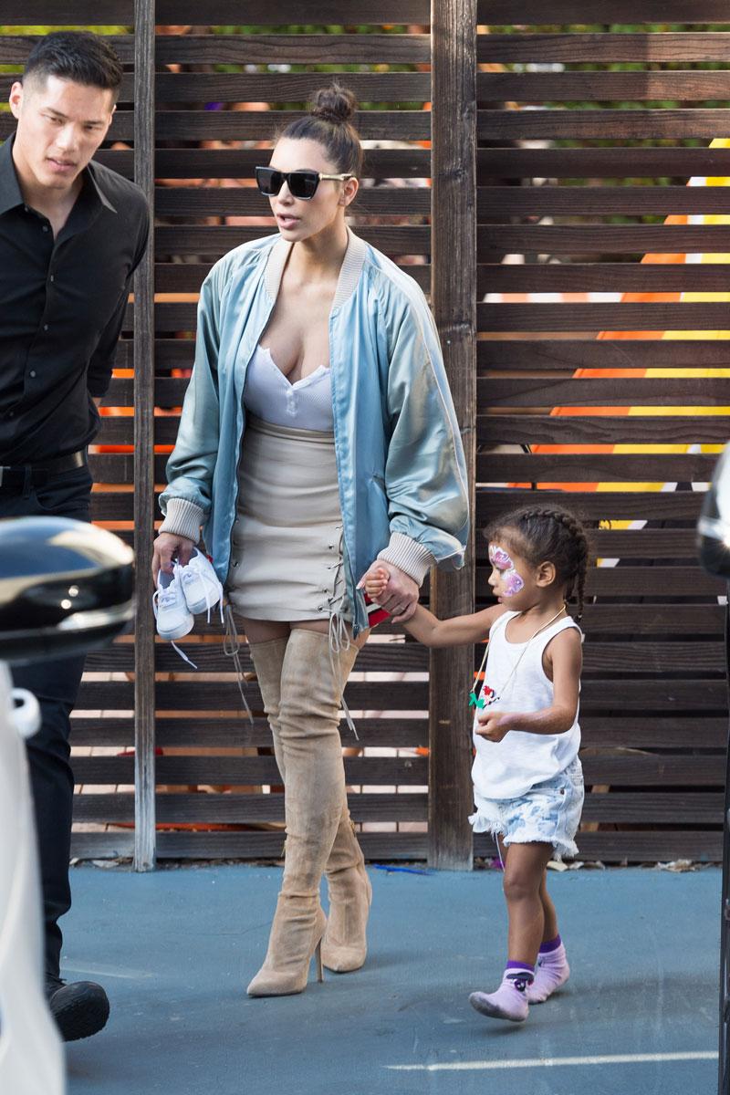 Kim Kardashian Squeezes Into Mini-Skirt & Thigh High Boots For Kids ...