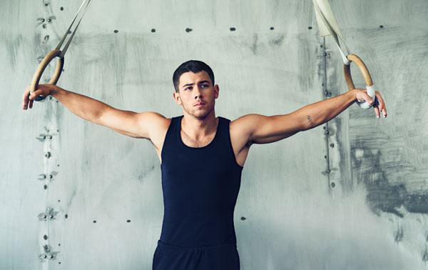 Sexy! Nick Jonas Lifts His Shirt And Reveals Taut Abs In 'men's Fitness'