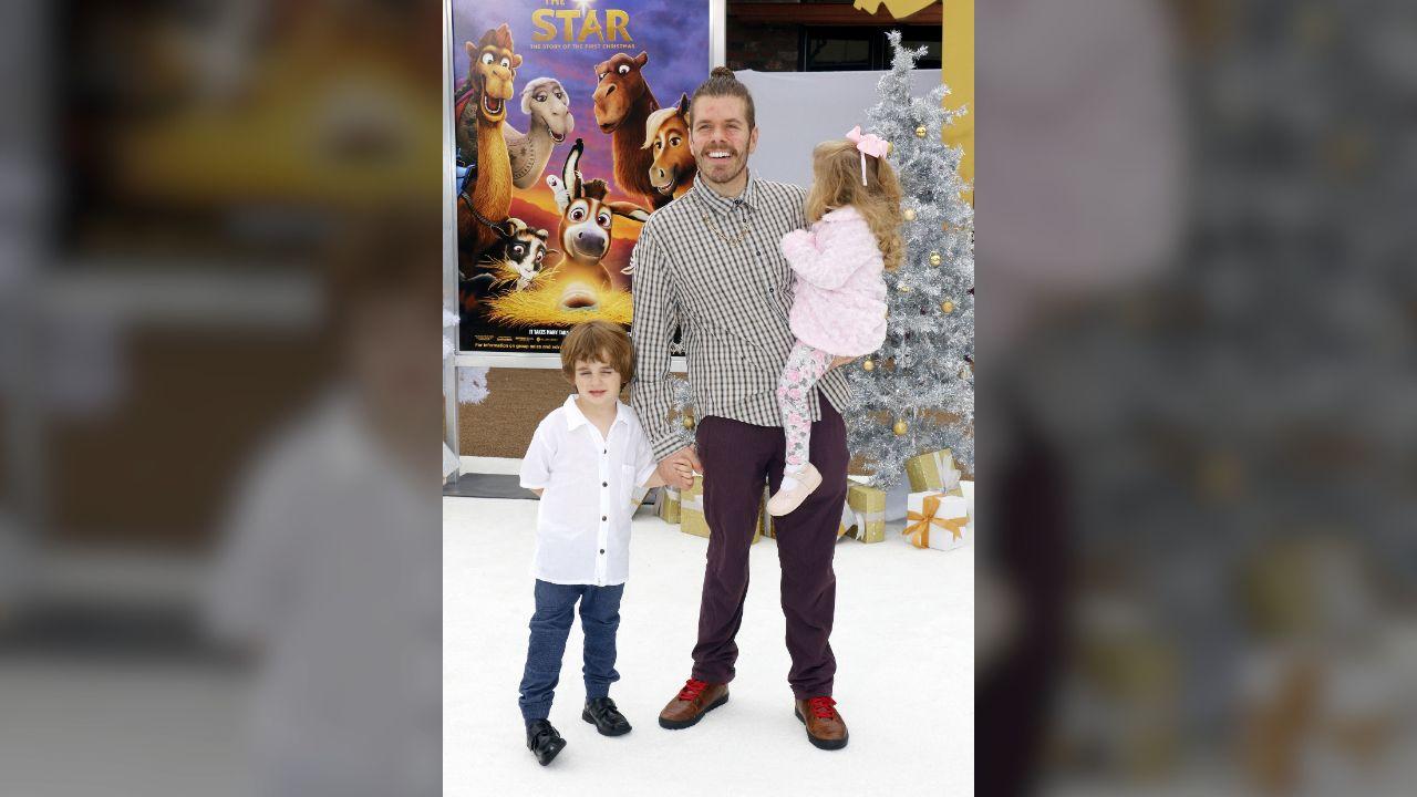 A photo of Perez Hilton and his kids