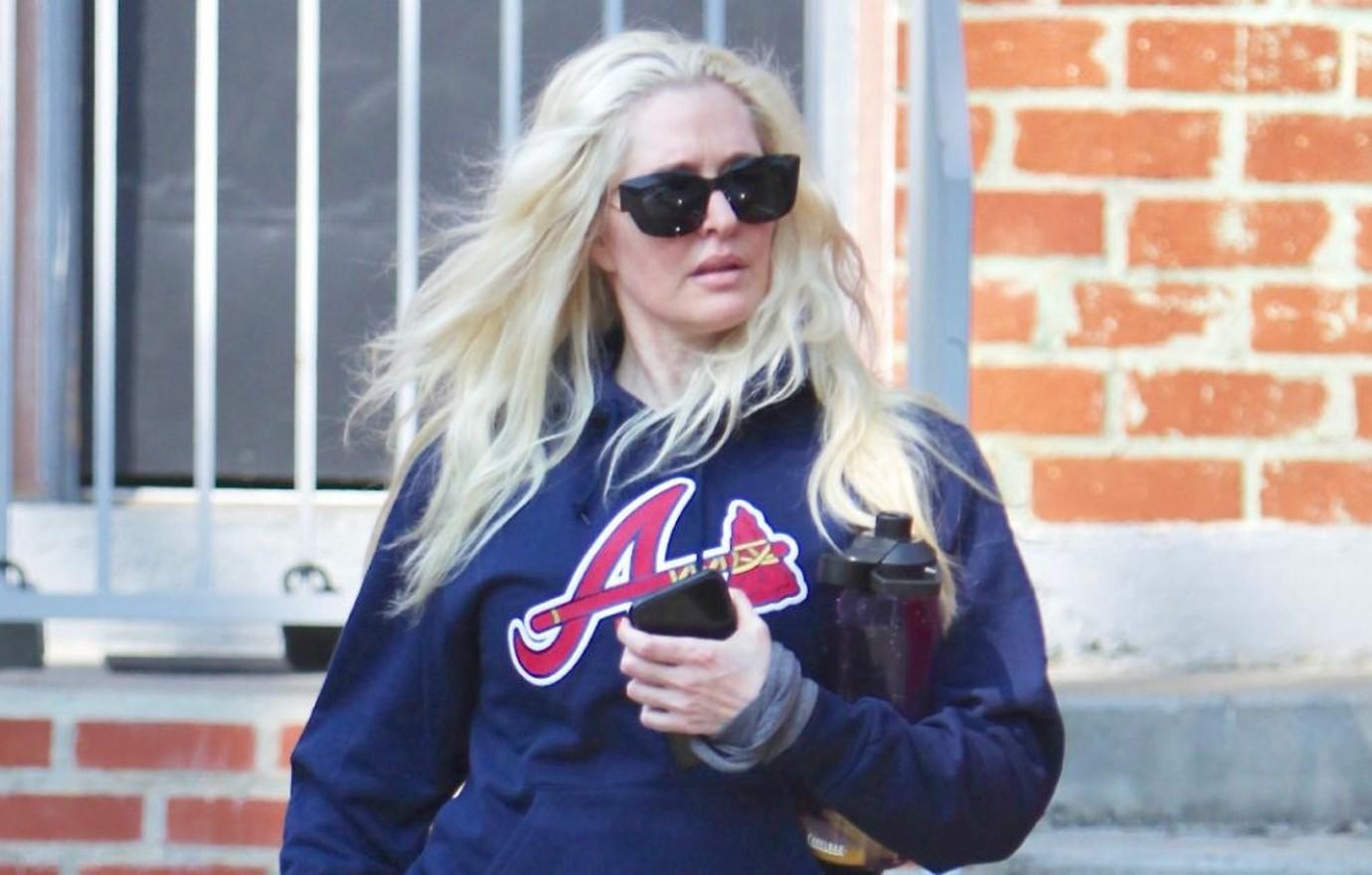 Erika Jayne Looks Worse For Wear Picking Up Toilet Paper As ...