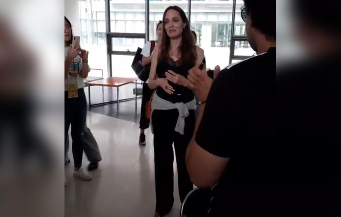 Angelina Jolie Inside School in South Korea Speaking Surrounded by Fans