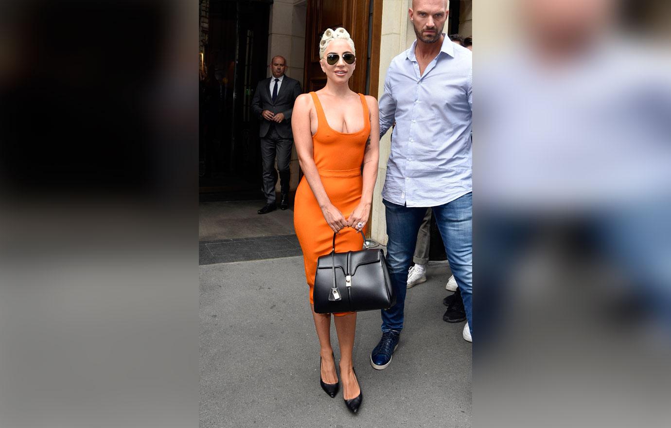 Wardrobe Malfunction! Lady Gaga Shows Nipples In Orange Dress