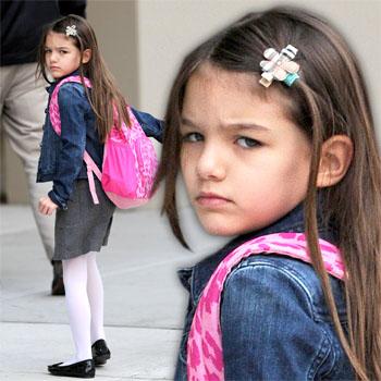 Surly Suri! Tom & Katie’s Little Girl Scowls Going To School