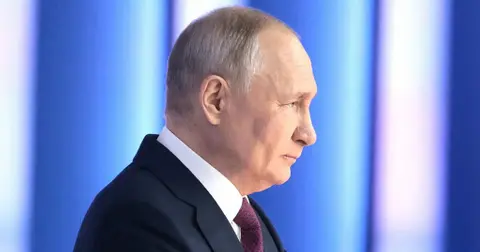 vladimir putin troops decapitate ukrainian soldier place head spike video jpg