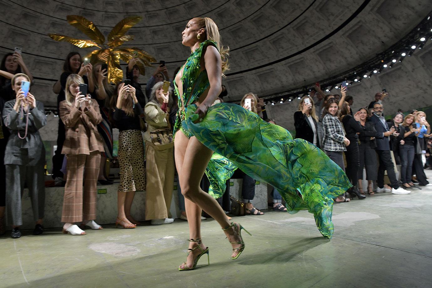 Jennifer Lopez Walks Versace Show in Grammys Lookalike Dress