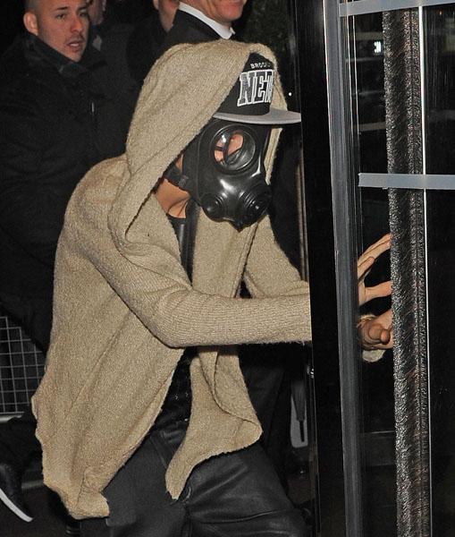 Justin Bieber is seen out and about in London wearing a gas mask