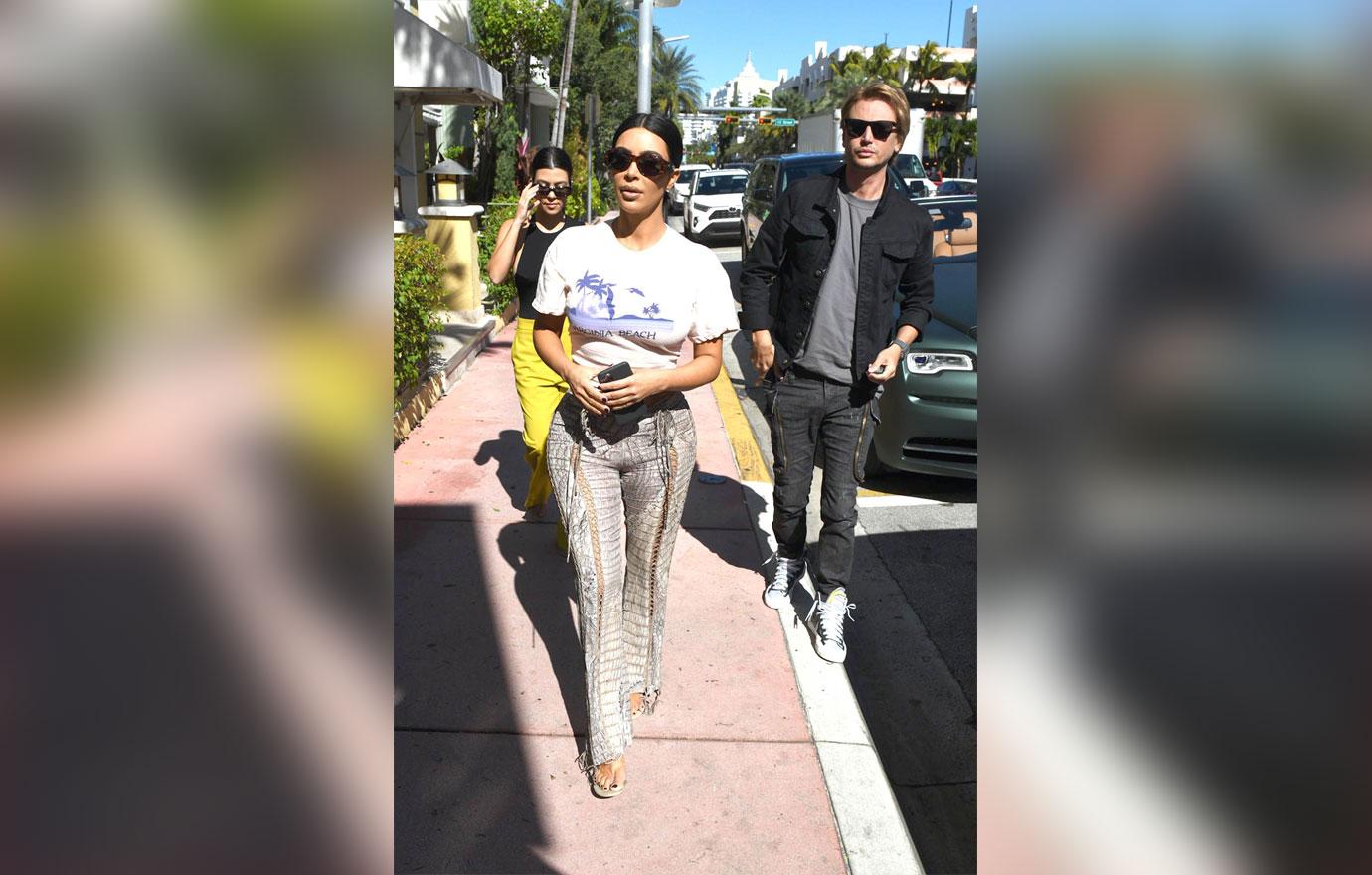 Kim and Kourtney Kardashian out in Miami in a green Rolls Royce with Jonathan Cheban