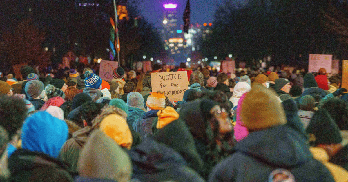 Photo of protestors after ICE-involved shooting.