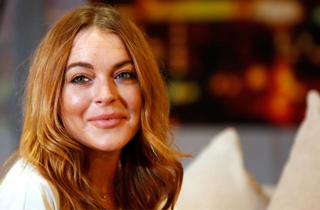 //lindsay lohan brushes off backlash after getting punched scandal pp