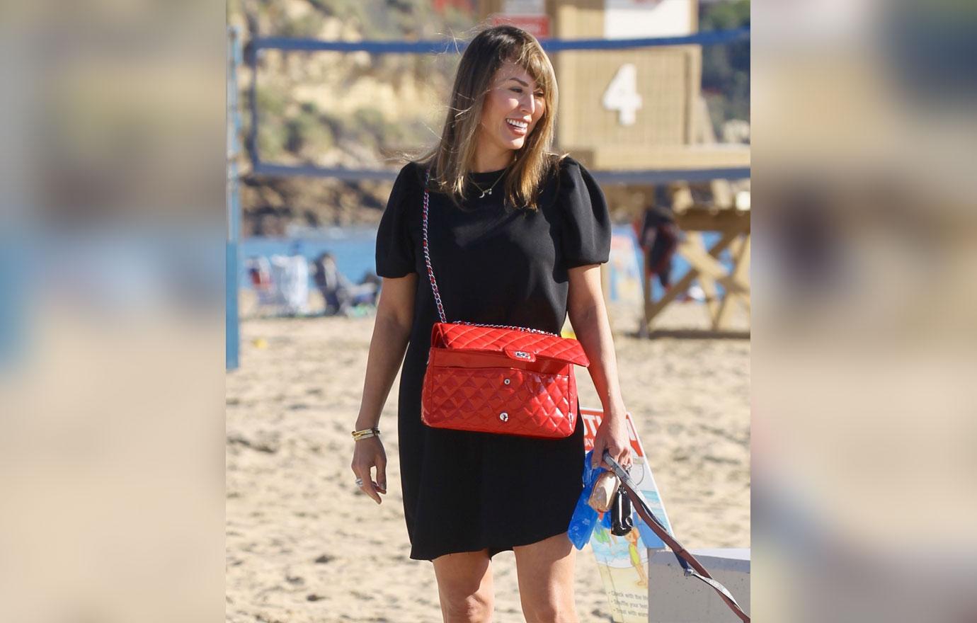 Kelly Dodd Walks Dogs Amid RHOC Chopping Block Talk