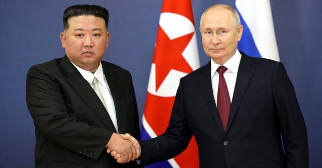 vladimir putin leg twitches meeting north korea kim jong unjpg