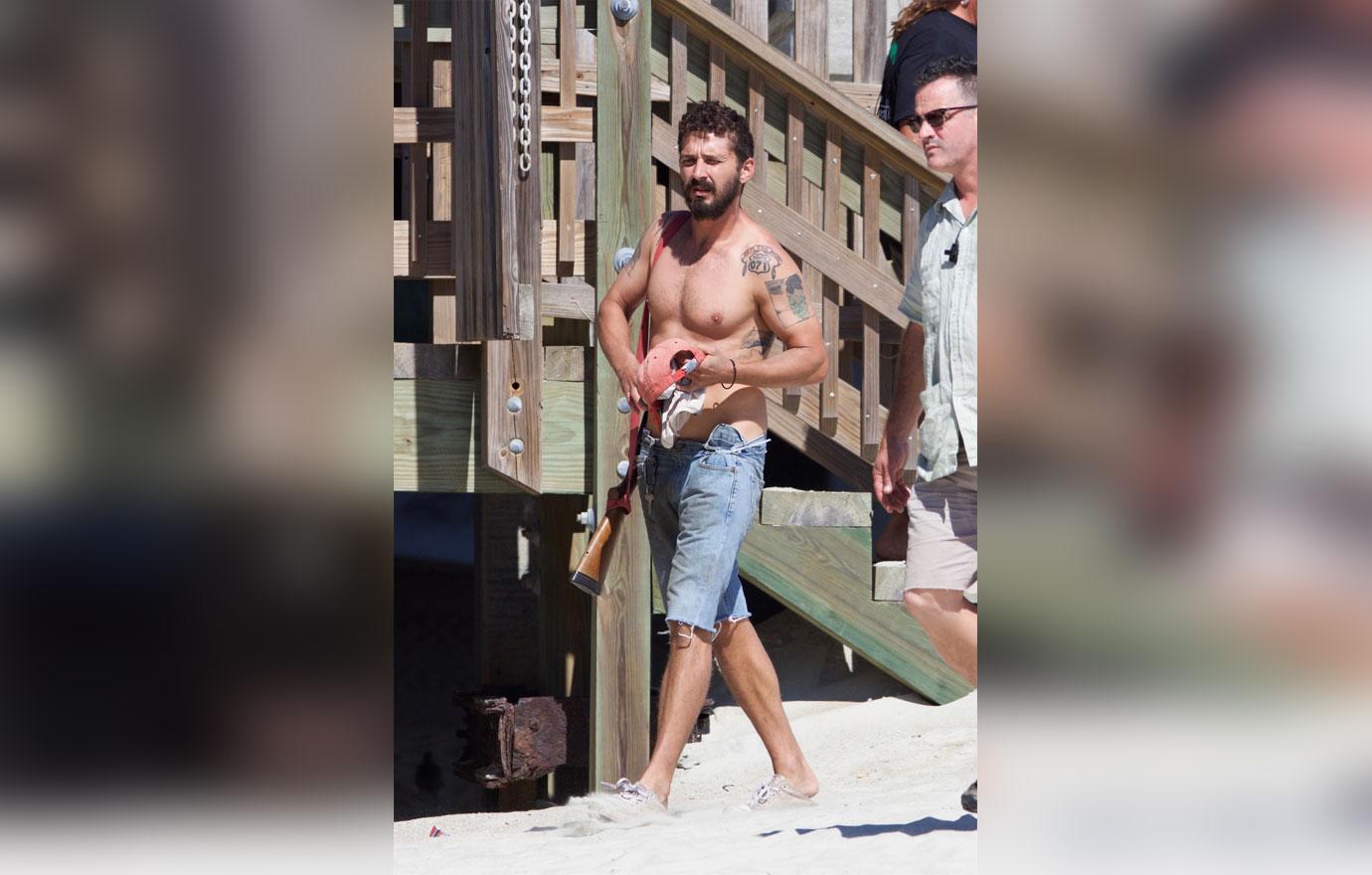 //Shia labeouf shirtless beach shotgun