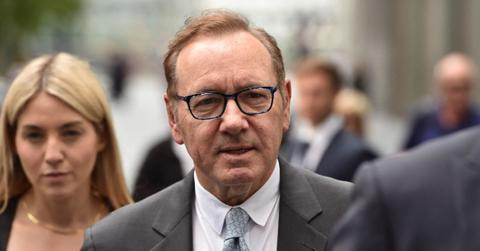Photo of Kevin Spacey in gray suit.