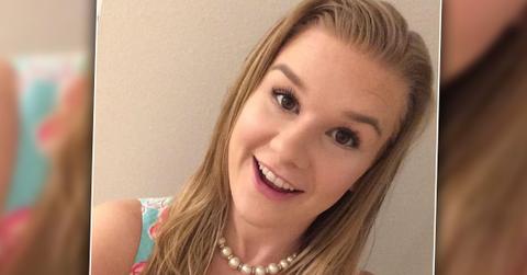 Photo of Mackezie Lueck Smiling Wearing Floral Top and Beaded Necklace