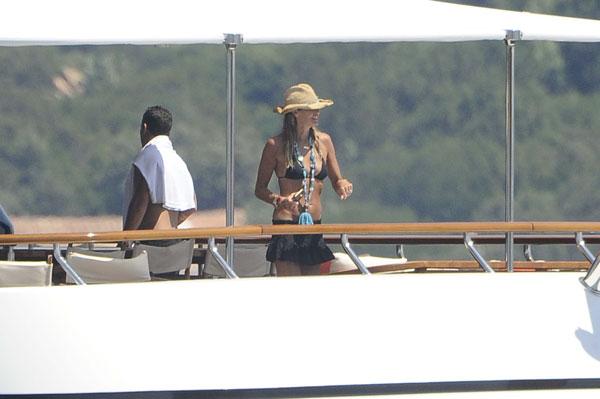 Elle Macpherson In A Bikini Going For A Swim In Italy