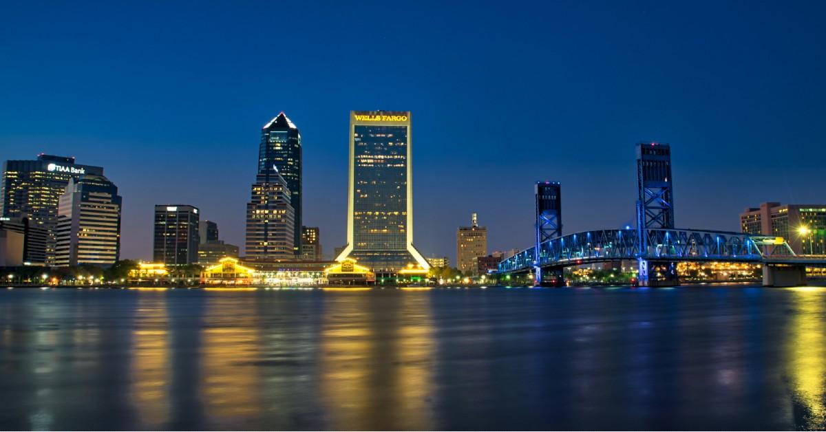 The skyline of Jacksonville, Florida at twilight, as viewed from across the St. John's River.