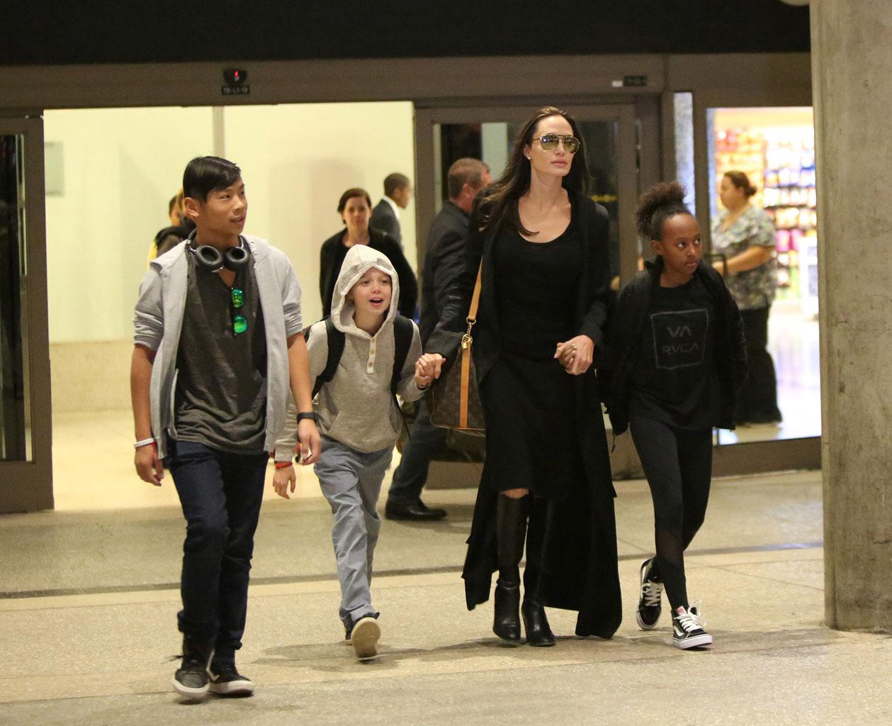 //angelina jolie kids lax tattoo