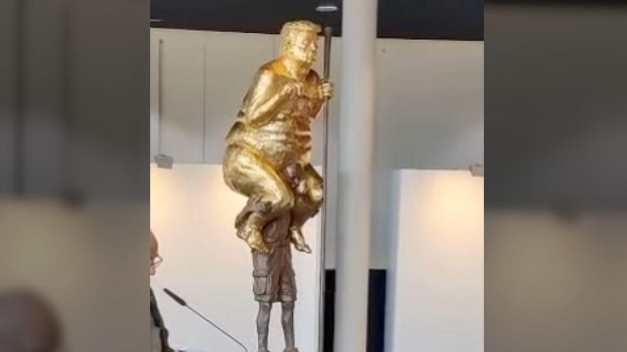 Photo of Trump Orange Plague Statue
