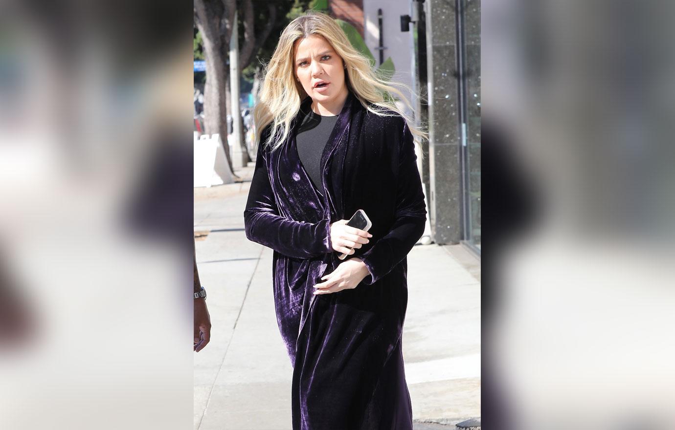 //khloe kardashian baby bump pregnant hiding belly