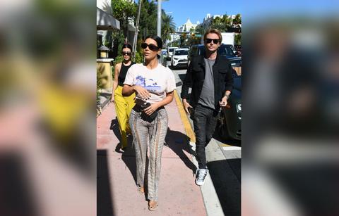 Kim and Kourtney Kardashian out in Miami in a green Rolls Royce with Jonathan Cheban