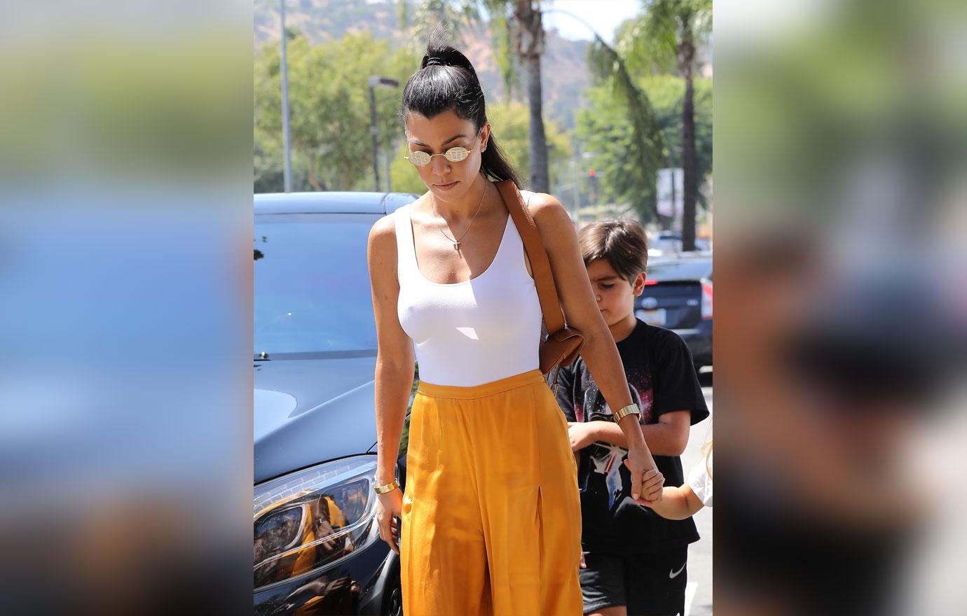 Kourtney Kardashian Goes Braless Yellow Pants