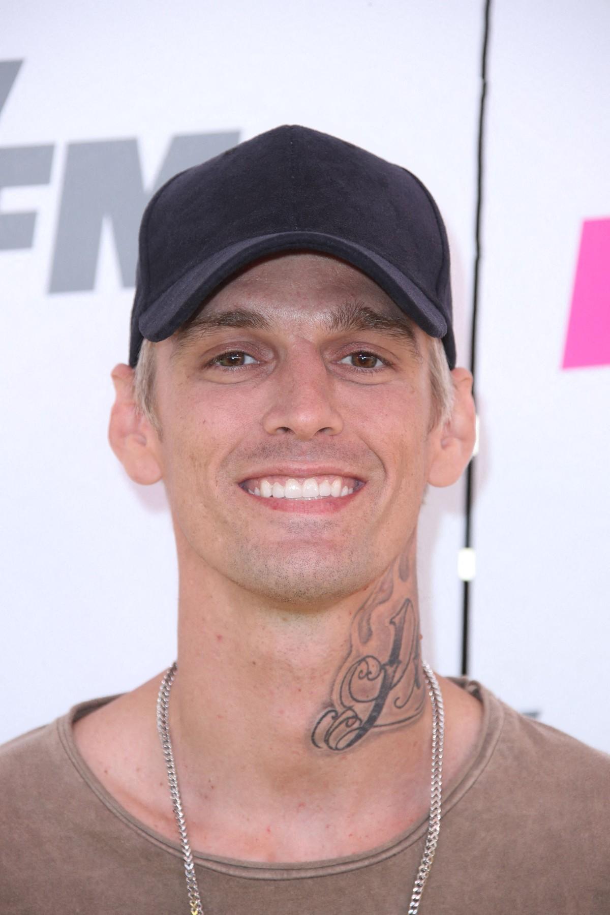 A medium told Hilary Duff that Aaron Carter was present and said 'This is not my job' during the session.