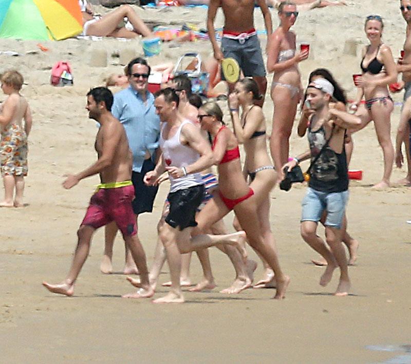 Tom Hiddleston Meets Taylor Swift's Bikini-Clad Squad -- Photos