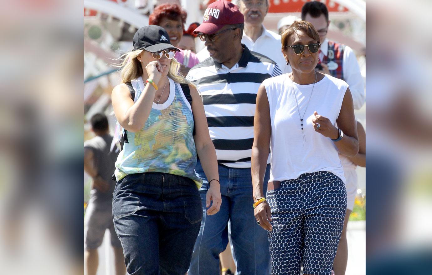 Robin Roberts and her wife Amber Laign have on a day out at Disneyland. Robin was seen riding the radiator springs racers and enjoying lunch at the Carthy Circle restaurant.