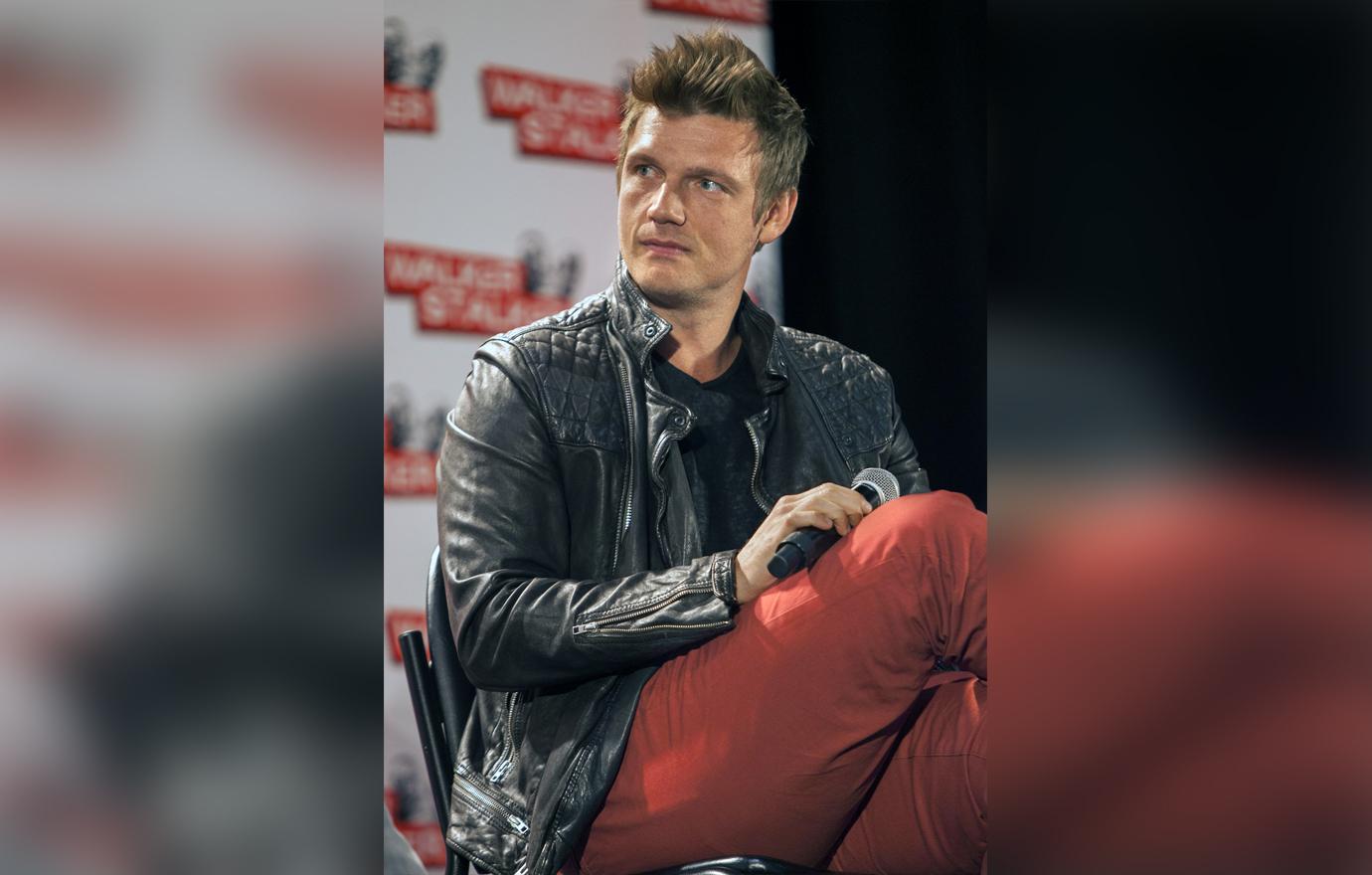 Nick Carter Looking Concerned Sitting At Conventional Panel Feud With Brother Aaron