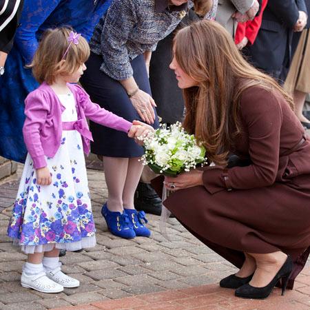 Video captures moment Kate Middleton lets baby play with her $845 handbag