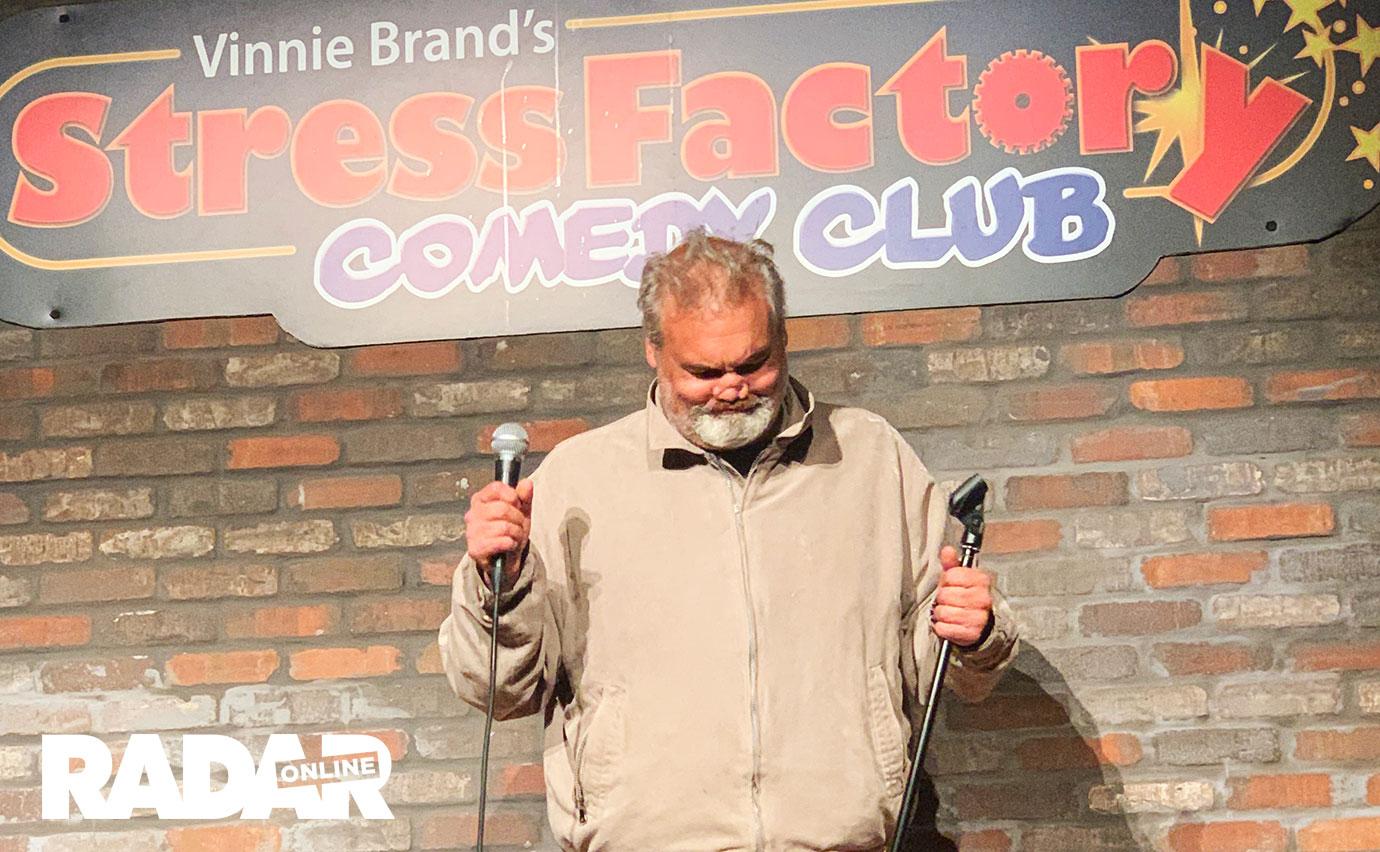 Arrtie Lange Performing On STage At Stress Factory Comedy Club