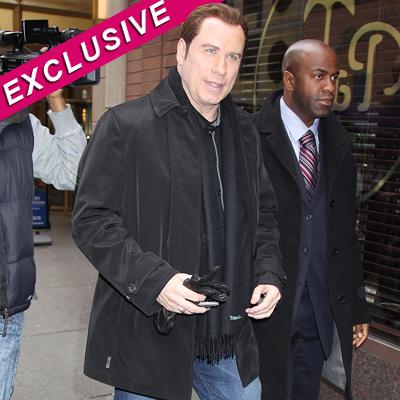 is john travolta gay and whos he dating