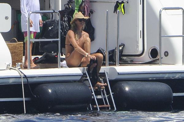 Elle Macpherson In A Bikini Going For A Swim In Italy