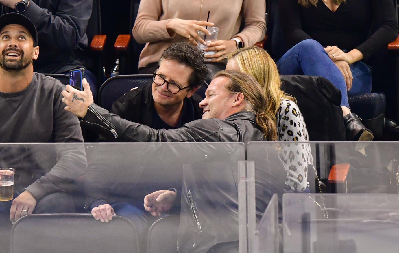 Michael J. Fox & Wife Tracy Pollan Attend Hockey Game Following Drinking Binge Admission