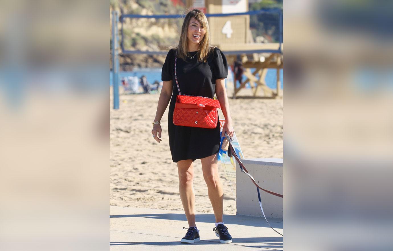 Kelly Dodd Walks Dogs Amid RHOC Chopping Block Talk