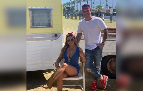 Brittany Cartwright Wearing Sunglasses, Royal Blue Top And Shorts With Red Bandana In Her Hair And Jax Taylor Wearing Sunglasses, White T-shirt and Jeans with Bandana Around His Head