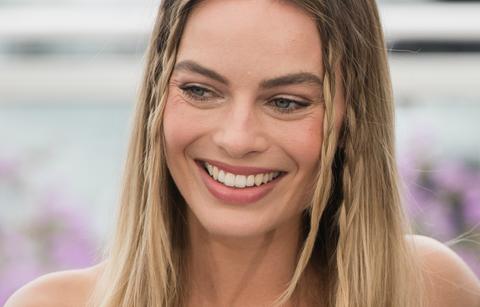 Margot Robbie was all smiles at the Cannes premiere of Quentin Tarantino’s Once Upon a Time in Hollywood {full frontal nudity}