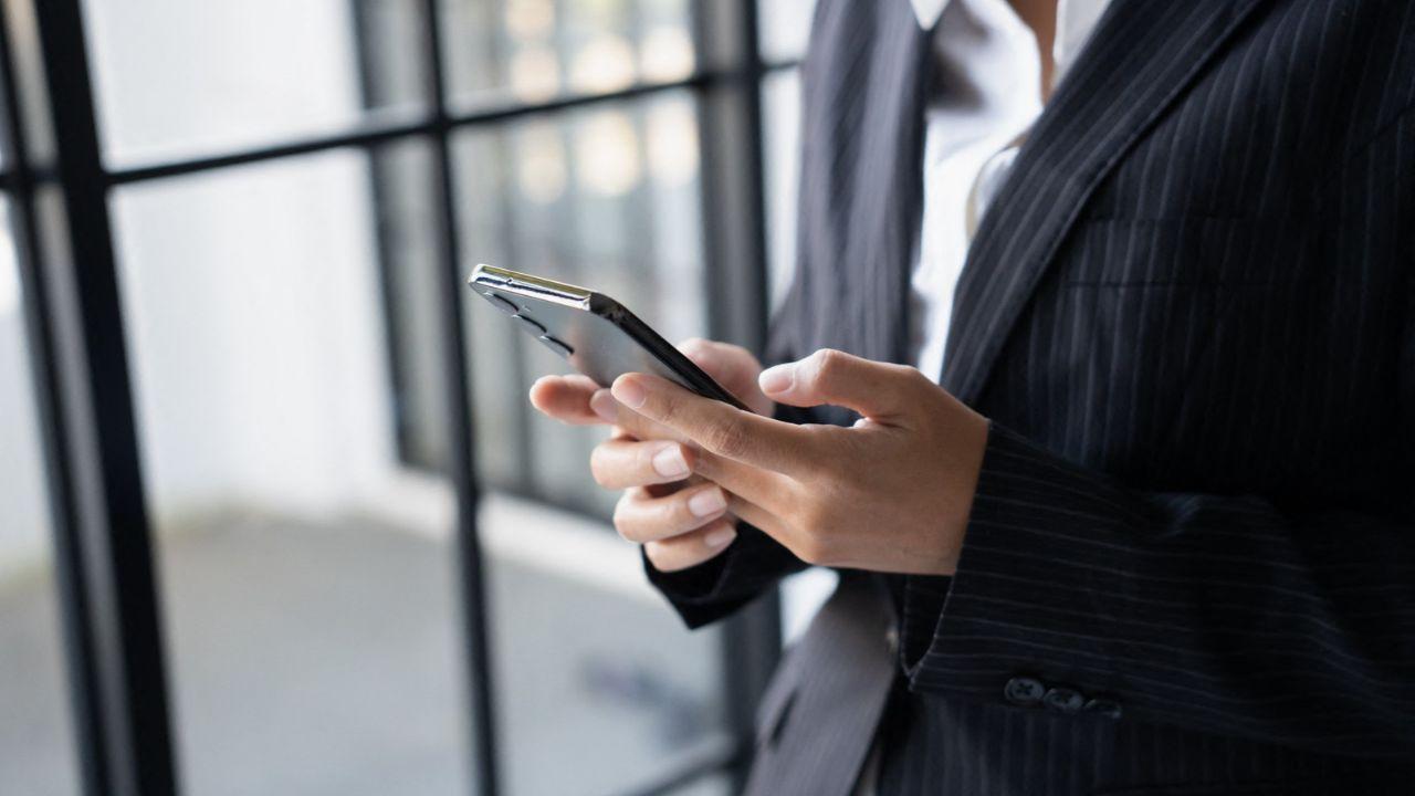 A photo of a person on a phone