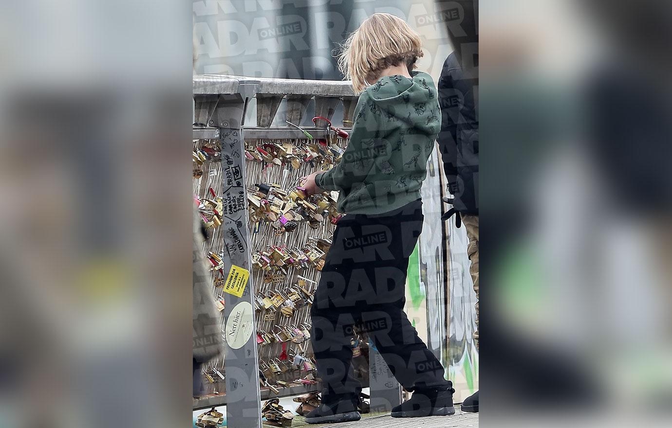 //brad pitt kids leave dads name off paris love lock