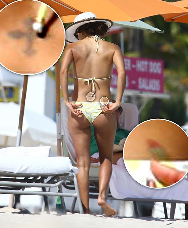 //eva longoria removing lower back tattoo tramp stamp