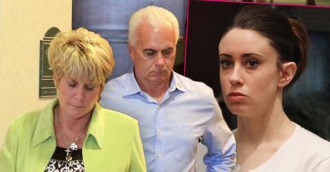 Casey Antony's Mom Wearing Green Blazer and Black and White Top Along With Father Earing Blue Shirt Inset Casey Anthony Where White Shirt