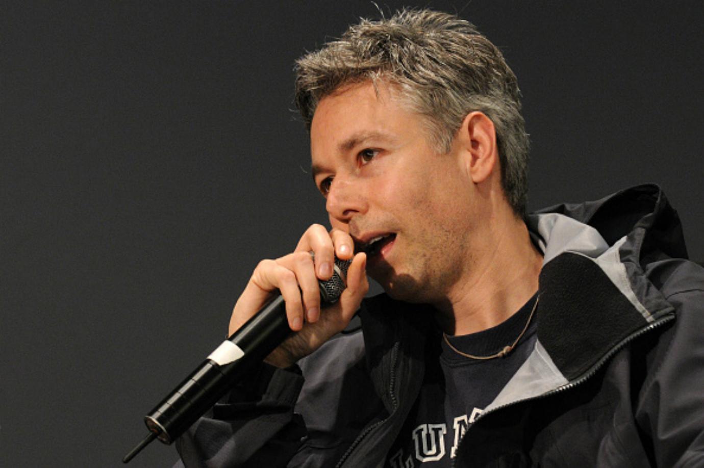 Adam Yauch performs on stage.