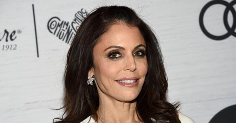 Bethenny Frankel Closeup Smiling Wearing Floral Earrings and White Dress