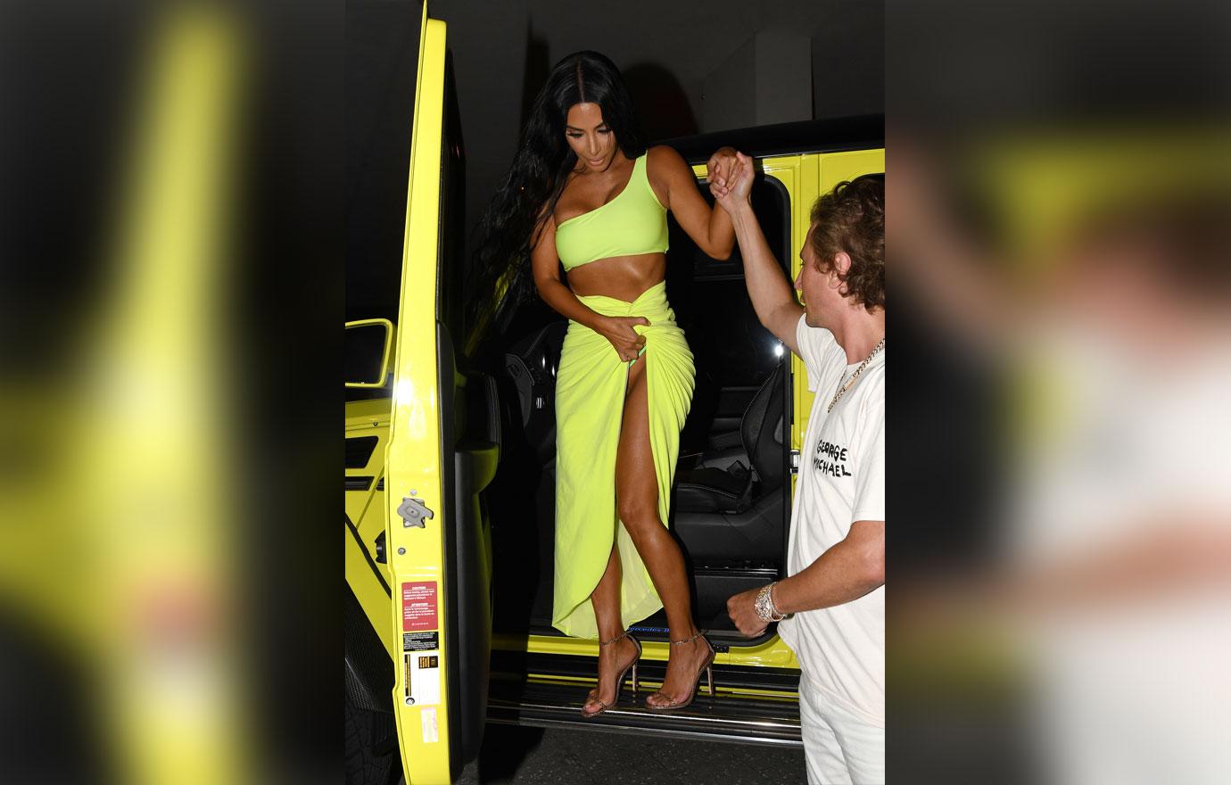 Kim Kardashian Flashes Neon Thong During Wardrobe Malfunction